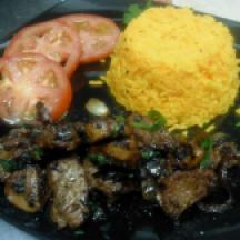 Garlic Steak and Mushrooms with Saffron Rice and Tomato Salad